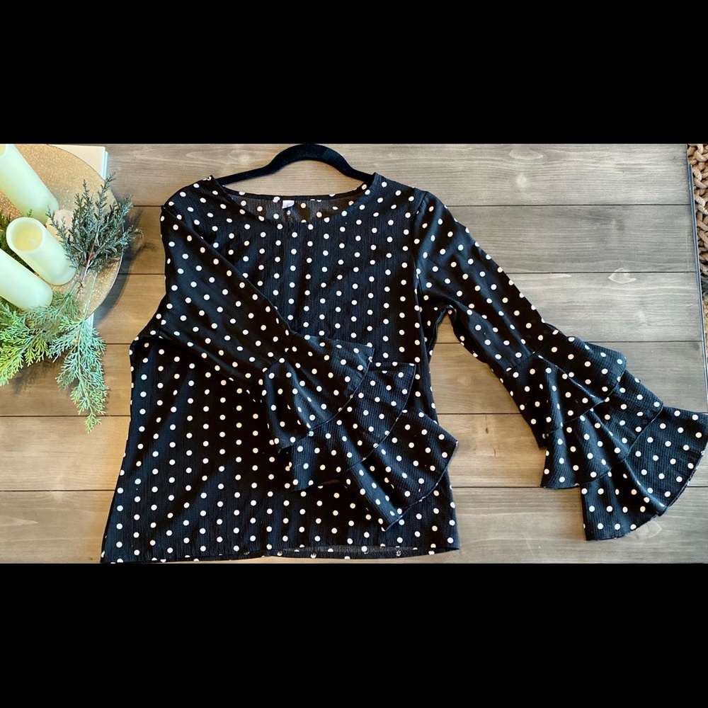 Cute polka dot blouse with super fun sleeves!